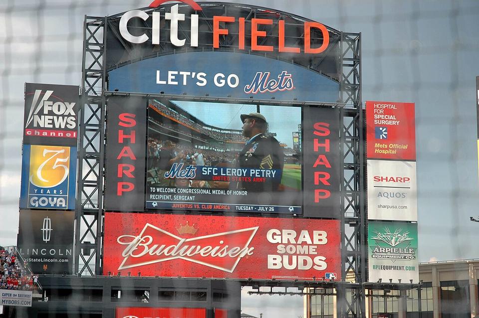 Sgt. 1st Class Leroy A. Petry, 75th Ranger Regiment Medal of Honor recipient, is recognized on the Citi Field big screen during the New York Mets and Philadelph