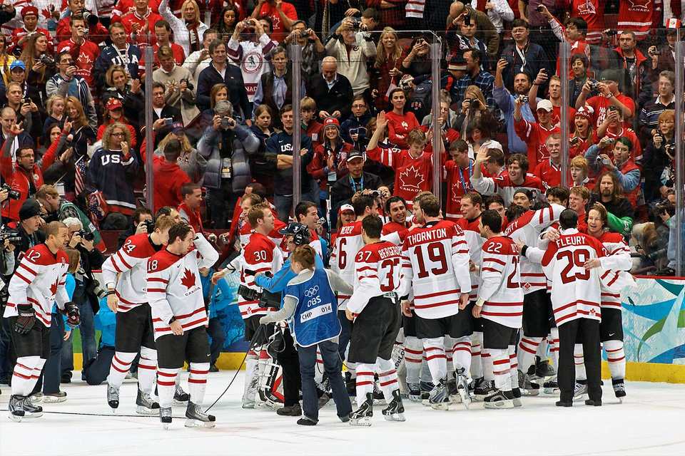 Canada wins GOLD! The whole team takes to the ice to start the celebration, seconds after Sidney Crosby scores the overtime winning goal, while the tens of mill